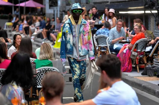 A model parades an outfit by Australian label Reborn By Home during Melbourne Fashion Week in Melbourne on November 25, 2020. (Photo by William West/AFP Photo)