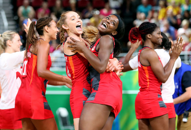 England's Helen Housby (left) and Jodie Gibson celebrate their win against New Zealand in the netball at the Gold Coast Convention and Exhibition Centre during day seven of the 2018 Commonwealth Games in the Gold Coast, Australia on April 11, 2018. (Photo by Martin Rickett/PA Images via Getty Images)