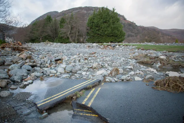 Rubble and stones are  left on the shoreline of Ullswater Llake next to the Cumbrian village of Glenridding after flash floods on December 10, 2015 in Penrith, England. local volunteers and emergency services worked though the night to divert the flood waters away from properties. Heaving overnight rain and high winds brought further flooding to the village of Glenridding, just four days after it was hit by Storm Desmond. (Photo by Christopher Furlong/Getty Images)