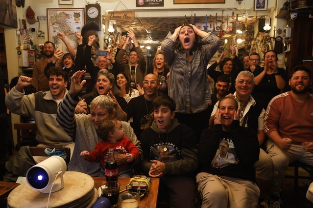 Michal Cohen (front left), the mother of Ohad Ben Ami, joins other relatives to celebrate Ohad's release from captivity in Gaza while watching a TV broadcast on February 8, 2025 in Tel Aviv, Israel. On Friday, Hamas informed the Israeli government that it intended to release Or Levy, Eli Sharabi, and Ohad Ben Ami as part of the latest wave of returned hostages, who were taken on Oct. 7, 2023. (Photo by Amir Levy/Getty Images)