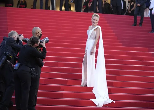Sharon Stone poses for photographers upon arrival at the awards ceremony and premiere of the closing film “OSS 117: From Africa with Love” at the 74th international film festival, Cannes, southern France, Saturday, July 17, 2021. (Photo by Vadim Ghirda/AP Photo)