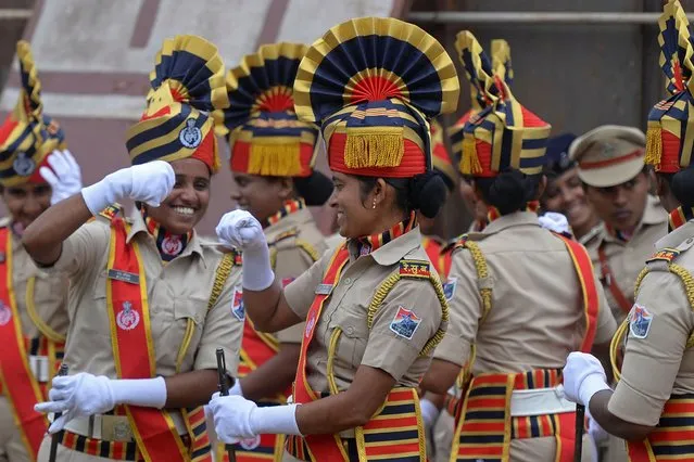 Indian Railway Protection Force (RPF) personnel gather to take part in a ceremony to celebrate country's 75th Independence Day at the railway sports complex ground in Hyderabad on August 15, 2022. (Photo by Noah Seelam/AFP Photo)