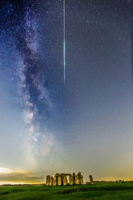 A perseid meteor and the Milky Way was captured over Stonehenge in Wiltshire on August 14, 2023, using a 30-second exposure to reveal details the naked eye cannot see. (Photo by Peter Brooks/Picture Exclusive)