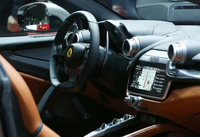 The interior of Ferrari GTC4Lusso car is pictured at the 86th International Motor Show in Geneva, Switzerland, March 1, 2016. (Photo by Denis Balibouse/Reuters)