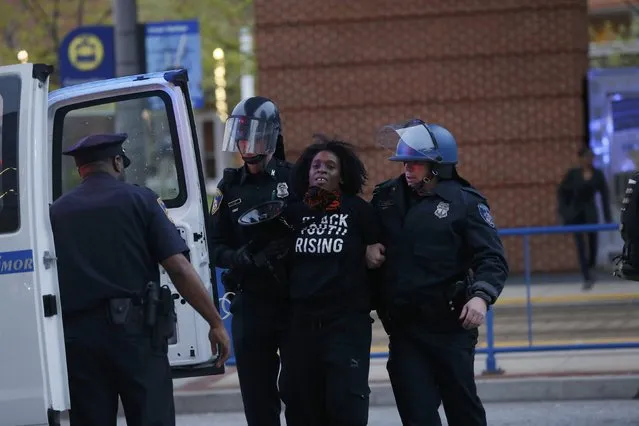 Police detain a protester at a rally to protest the death of Freddie Gray who died following an arrest in Baltimore, Maryland April 25, 2015. (Photo by Shannon Stapleton/Reuters)