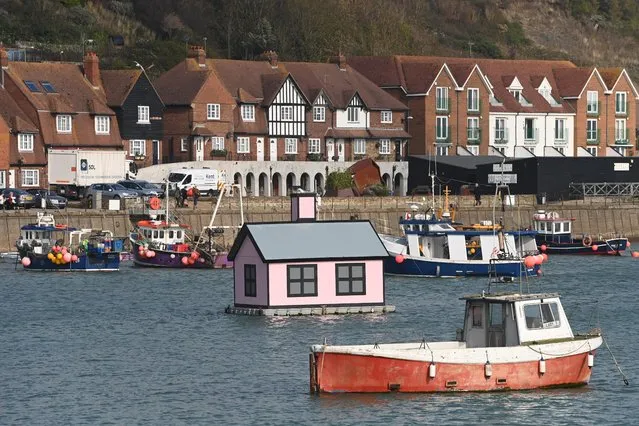 Richard Wood's “Holiday Homes” artwork is pictured by the harbour in Folkstone, Britain, 19 October 2021. (Photo by Facundo Arrizabalaga/EPA/EFE)