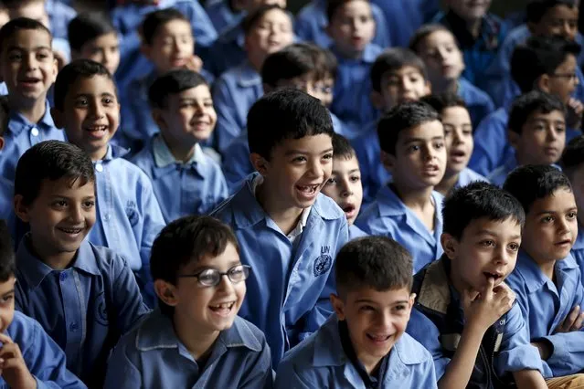Kids react as they watch a theater puppet show at an UNRWA school in Burj al-Barajneh in Beirut May 14, 2015. (Photo by Mohamed Azakir/Reuters)