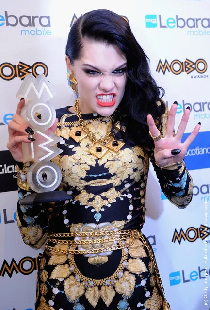 Jessie J poses with one of her four awards during the MOBO Awards 2011