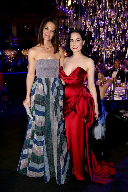 Katie Holmes (L) and Dita Von Teese wearing dress by Lena Hoschek attend the LIFE+ Solidarity Gala prior to the Life Ball 2019 at Spiegelzelt in the City Hall on June 08, 2019 in Vienna, Austria. After 26 years the charity event Life Ball will take place for the very last time, raising funds for HIV & AIDS projects. (Photo by Thomas Niedermueller/Life Ball 2019/Getty Images)