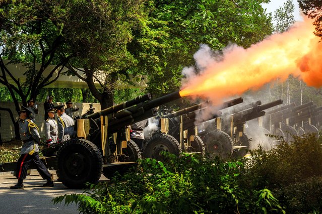 Cannons fire a twenty-one gun salute at the National Cemetery as South Korea marks Memorial Day, which honours those who died during the 1950-53 Korean War and in other operations while serving their country, in Seoul on June 6, 2024. (Photo by Anthony Wallace/AFP Photo)