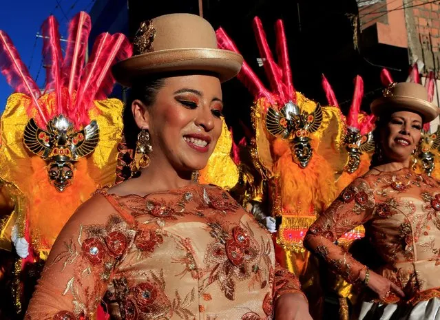 Morenada dancers perform during the “Senor del Gran Poder” (Lord of Great Power) parade in La Paz, May 21, 2016. (Photo by David Mercado/Reuters)