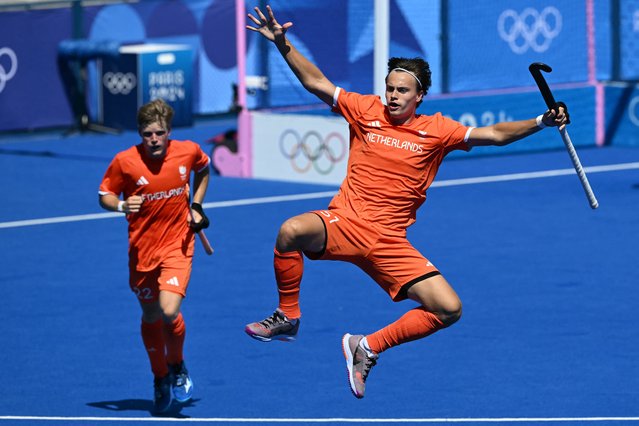 Netherlands' forward #51 Duco Telgenkamp celebrates scoring his team's fourth goal in the men's semi-final field hockey match between Netherlands and Spain during the Paris 2024 Olympic Games at the Yves-du-Manoir Stadium in Colombes on August 6, 2024. (Photo by Arun Sankar/AFP Photo)