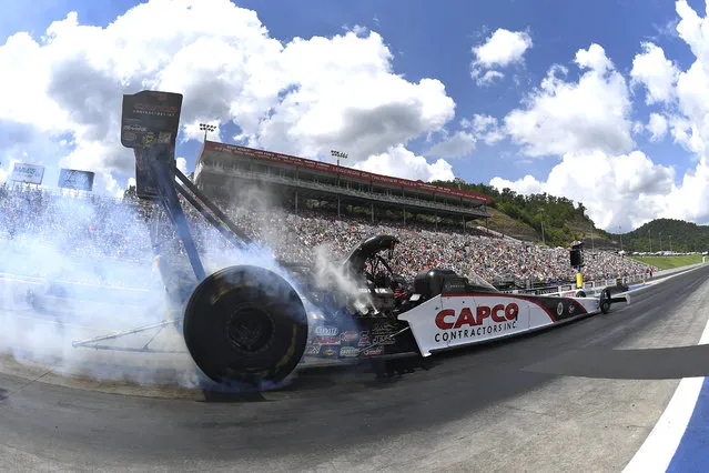 In this photo provided by the NHRA, Steve Torrence takes part in Top Fuel qualifying Saturday, June 17, 2017, at the NHRA Thunder Valley Nationals drat races at Bristol Dragway in Bristol, Tenn. Torrence’s pass of 3.772 seconds at 319.29 mph gave him the No. 1 spot for Sunday's eliminations. (Photo by Marc Gewertz/NHRA via AP Photo)
