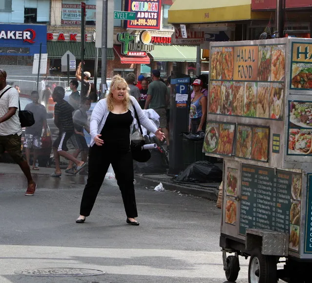 Rebel Wilson gets hit by a Halal Food Truck on the “Isn't it Romantic” movie set in Corona, Queens, New York on July 17, 2017. (Photo by Jose Perez/Splash News and Pictures)