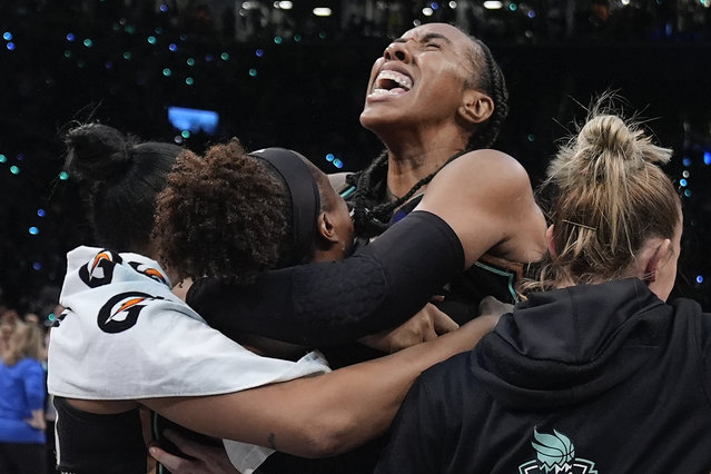 The New York Liberty celebrate after defeating the Minnesota Lynx in Game 5 of the WNBA basketball final series to win the WNBA championship, Sunday, October 20, 2024, in New York. (Photo by Pamela Smith/AP Phot)