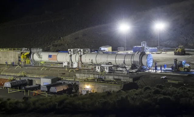 The Space Launch System's booster is seen a few hours ahead of the second and final qualification motor (QM-2) test, Tuesday, June 28, 2016, at Orbital ATK Propulsion Systems test facilities in Promontory, Utah. (Photo by Bill Ingalls/NASA via AP Photo)