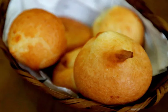 Paes de queijo (cheese bread) lies in a basket at the Cultivar cafe and store at Santa Teresa neighbourhood in Rio de Janeiro, Brazil, July 28, 2016. (Photo by Sergio Moraes/Reuters)