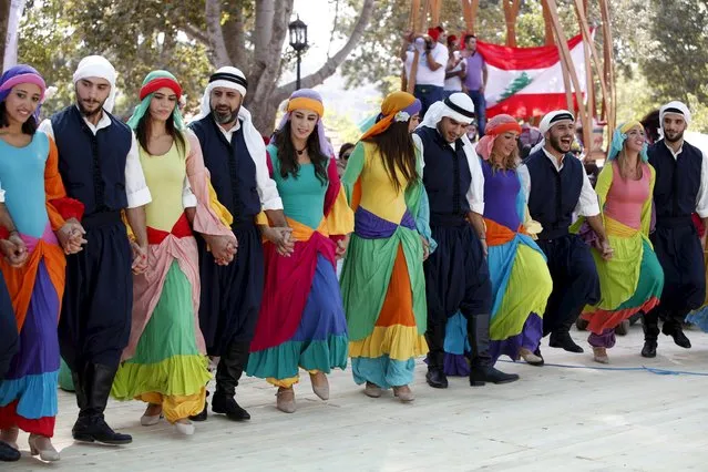 Lebanese traditional dancers perform the Dabkeh during a traditional dance festival held in Maaser al Shouf village in Mount Lebanon September 13, 2015. (Photo by Jamal Saidi/Reuters)