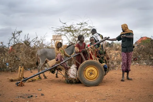 A Somali family that arrived waits to be given a spot to settle at a camp for displaced people on the outskirts of Dollow, Somalia on Tuesday, September 20, 2022. (Photo by Jerome Delay/AP Photo)