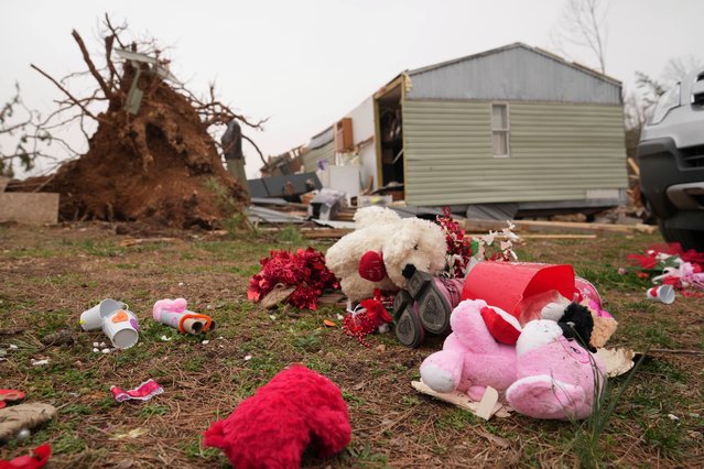 Debris from a severe storm is scattered outside a damaged home Saturday, March 15, 2025, in Wayne County, Mo. (Photo by Jeff Roberson/AP Photo)