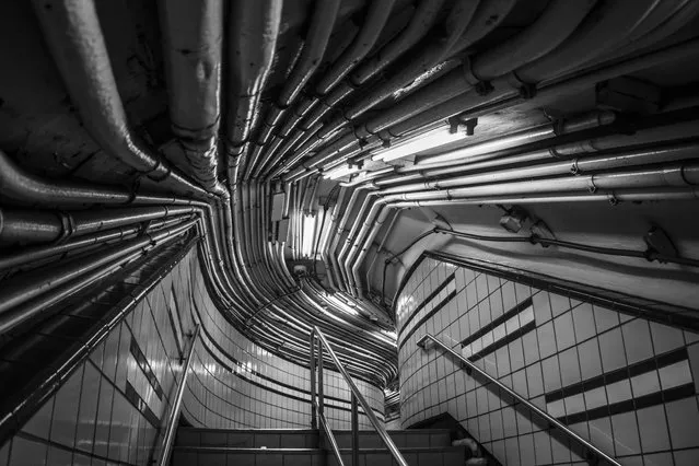 “Manmade Cave” by Gautam Kamat Bambolkar; New York, USA. “Rugged textured cable pipes ran over my head at a train station in New York, creating a trance-like pattern. They ran from the edge of the entrance towards an infinite end. It looked like nothing less than a scary manmade cave”. (Photo by Gautam Kamat Bambolkar/Art of Building Photography Awards 2017)