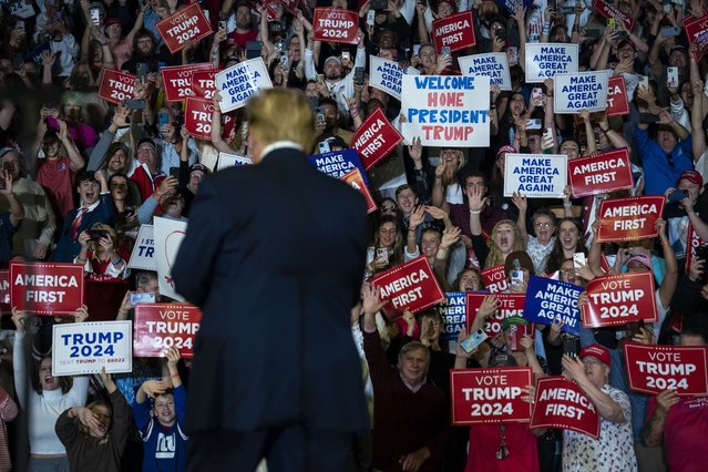 Supporters cheer as Republican presidential candidate and former President Donald Trump walks out to speak at a speaks at a Get Out The Vote campaign rally held at Coastal Carolina University in Conway, SC on Saturday, February 10, 2024. (Photo by Jabin Botsford/The Washington Post)