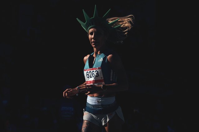Laura Dufour, of France, passes by Queensboro bridge during the New York City Marathon in New York, Sunday, November 2, 2025. (Photo by Andres Kudacki/AP Photo)