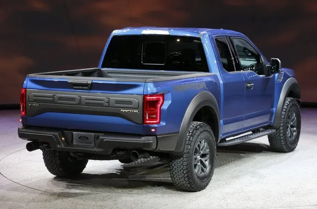 A Ford Raptor pickup truck is displayed during the first press preview day of the North American International Auto Show in Detroit, Michigan, January 12, 2015. (Photo by Mark Blinch/Reuters)