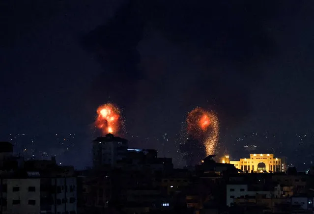 Explosions light up the sky after the Israeli military said in a statement that it has struck Islamic Jihad targets, in Gaza, May 9, 2023. (Photo by Mohammed Salem/Reuters)