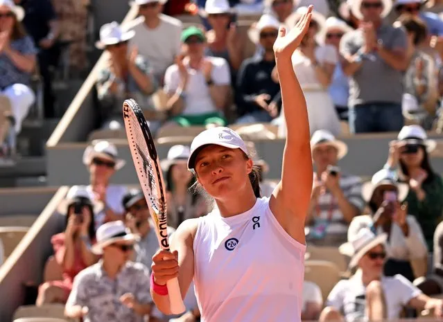 Iga Swiatek of Poland reacts after winning 6-0, 6-0 against Xinyu Wang of China in their Women's Singles third round match during the French Open Grand Slam tennis tournament at Roland Garros in Paris, France, 03 June 2023. (Photo by Caroline Blumberg/EPA)