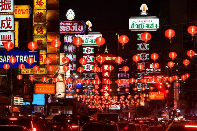 Lanterns are seen over a street ahead of the Lunar New Year celebration in Bangkok, Thailand, February 10, 2021. (Photo by Chalinee Thirasupa/Reuters)