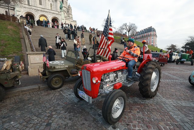 Vintage vehicles take part in the 25th Traversée de Paris, which follows a 20-mile (30km) route through the city in Paris, France on January 12, 2025. (Photo by Anadolu/Getty Images)