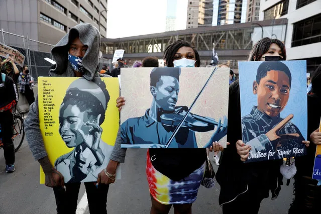 Protesters march on the day of opening statements in the trial of the former police officer Derek Chauvin, who is accused of killing George Floyd last year in Minneapolis, Minnesota on March 29, 2021. (Photo by Octavio Jones/Reuters)