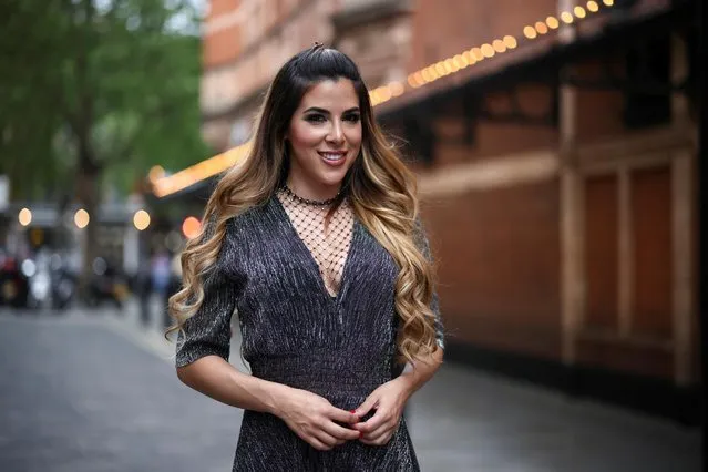 Actress Aimie Atkinson, who is appearing in West End show “The Show Must Go On”, poses outside the Palace Theatre, amid the spread of coronavirus disease (COVID-19) in London, Britain, June 2, 2021. (Photo by Henry Nicholls/Reuters)