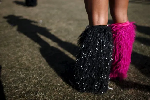 A woman wears furry boots at the Coachella Valley Music and Arts Festival in Indio, California April 11, 2015. (Photo by Lucy Nicholson/Reuters)