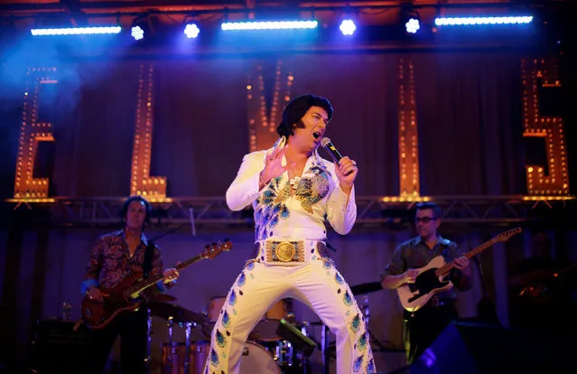 Ultimate Elvis tribute artist winner Brendon Chase of Auckland, New Zealand performs in the final of the contest at the 25th annual Parkes Elvis Festival in the rural Australian town of Parkes, west of Sydney, January 14, 2017. (Photo by Jason Reed/Reuters)