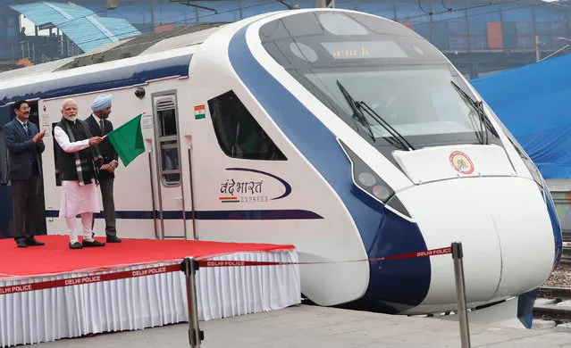 Prime Minister Narendra Modi flags off India's fastest train 'Vande Bharat Express' at a ceremony in New Delhi, India, February 15, 2019. (Photo by Adnan Abidi/Reuters)