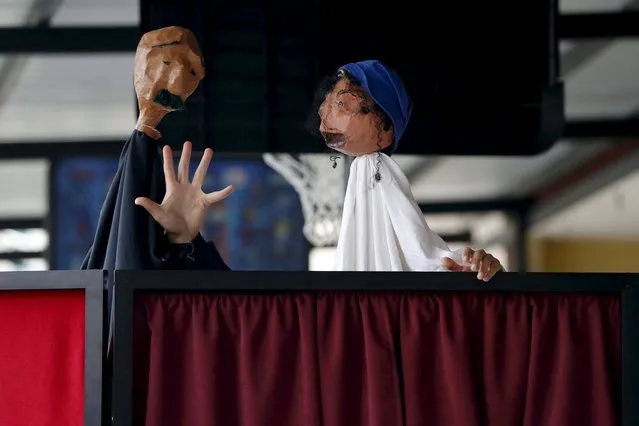 A scene from a theater puppet show is performed at an UNRWA school in Burj al-Barajneh in Beirut May 14, 2015. (Photo by Mohamed Azakir/Reuters)