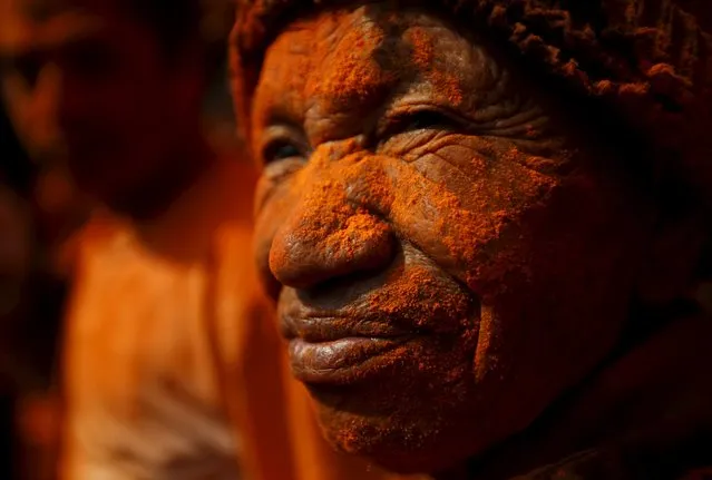 A devotee smeared in vermillion powder is pictured while celebrating the “Sindoor Jatra” vermillion powder festival at Thimi, in Bhaktapur, Nepal, April 14, 2016. (Photo by Navesh Chitrakar/Reuters)