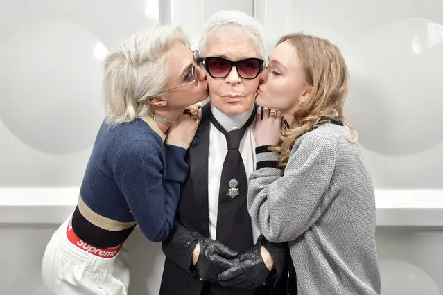 (L-R) Cara Delevingne, Karl Lagerfeld and Lily-Rose Depp backstage at the Chanel show during Paris fashion week in Paris, France on March 7, 2017. (Photo by Swan Gallet/Rex Features/Shutterstock)