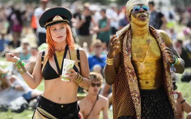 Festival-goers dance as South African band BCUC (Bantu Continua Uhuru Consciousness) perform on the West Holts stage on day three of Glastonbury Festival at Worthy Farm, Pilton on June 28, 2019 in Glastonbury, England. Glastonbury is the largest greenfield festival in the world, and is attended by around 175,000 people. (Photo by Leon Neal/Getty Images)