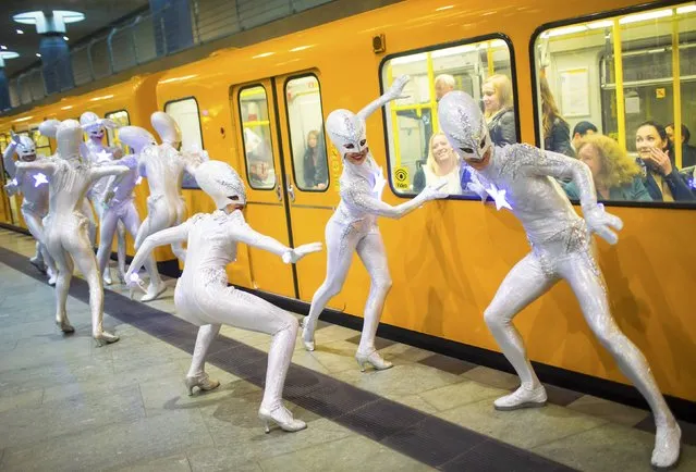 Dancers of the Friedrichstadt-Palast from the show “THE WYLD” pose during a promotional photocall on the platform of an underground train station in Berlin, Germany, June 23, 2015. (Photo by Hannibal Hanschke/Reuters)