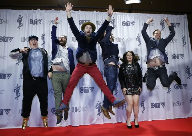 The Strumbellas celebrate with their Junos backstage at the 2017 Juno Awards in Ottawa, Ontario, Canada, April 2, 2017. (Photo by Chris Wattie/Reuters)