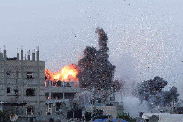 Smoke and flames rise during an Israeli air strike in central Gaza Strip, on June 3, 2024. (Photo by Ramadan Abed/Reuters)