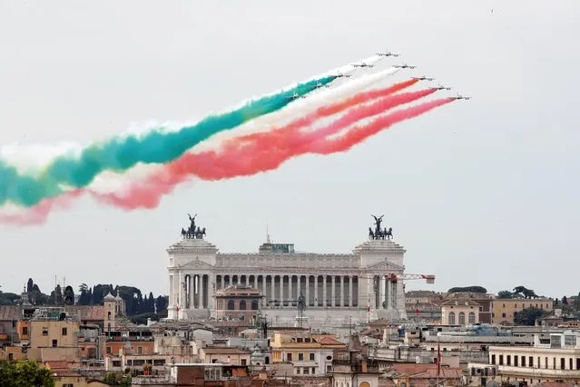 The aerobatic demonstration team of the Italian Air Force, the Frecce Tricolori (Tricolor Arrows), perform over the city on Republic Day, in Rome, Italy, June 2, 2021. (Photo by Remo Casilli/Reuters)