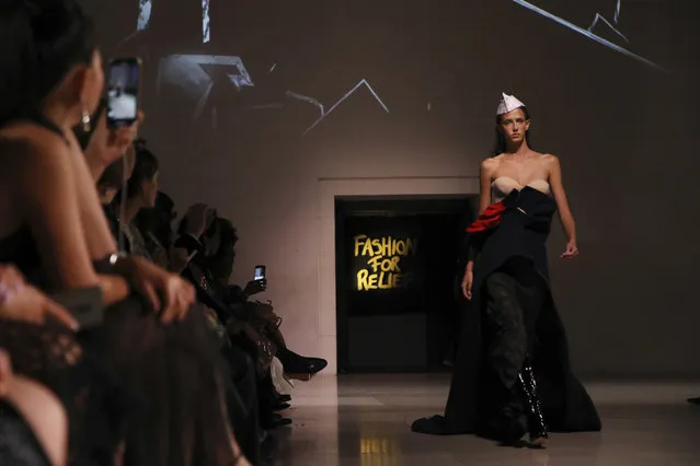 A model walks the runway at the Fashion For Relief charity event in central London, Saturday, September 14, 2019. (Photo by Vianney Le Caer/Invision/AP Photo)