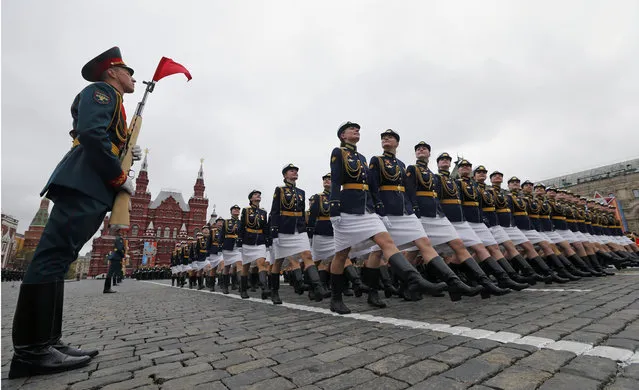 Russian female army soldiers march along the Red Square during the Victory Day military parade to celebrate 72 years since the end of WWII and the defeat of Nazi Germany, in Moscow, Russia, on Tuesday, May 9, 2017. (Photo by Yuri Kochetkov/Pool Photo via AP Photo)