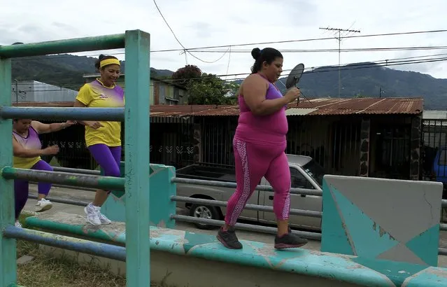 Women take part in an aerobics class in Los Guidos de Desamparados July 23, 2015. (Photo by Juan Carlos Ulate/Reuters)