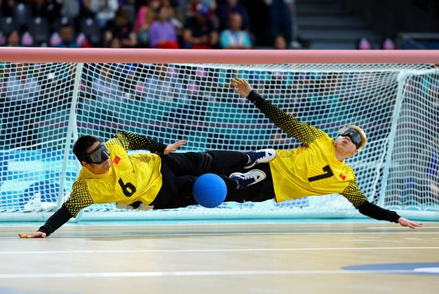 Yu Qinquan and Yu Deyi of China in action against Brazil during their men's bronze medal goalball match at the Paris Paralympics on September 5, 2024. (Photo by Kacper Pempel/Reuters)