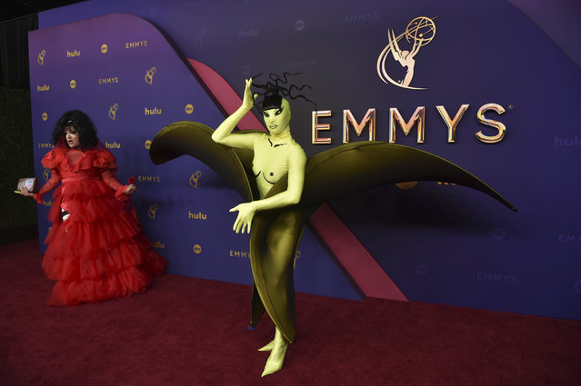 Megami, left, and Nymphia Wind arrive at the 76th Primetime Emmy Awards on Sunday, September 15, 2024, at the Peacock Theater in Los Angeles. (Photo by Richard Shotwell/Invision/AP Photo)